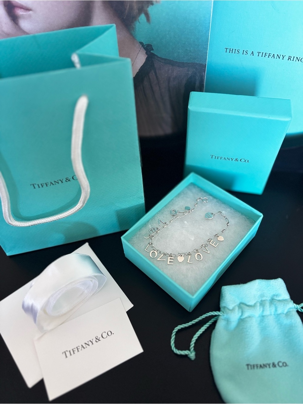Tiffany & Co. Silver LOVE Notes Charm Bracelet